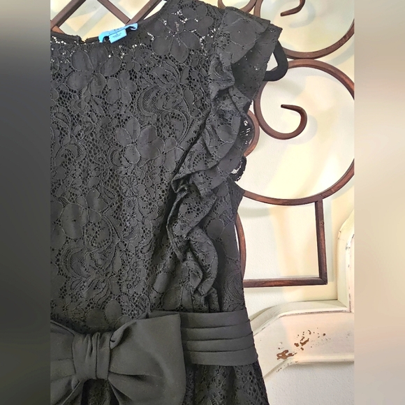 Black CeCe Lace Peplum Top with ruffled sleeves size S with a Bow accent - Picture 5 of 8